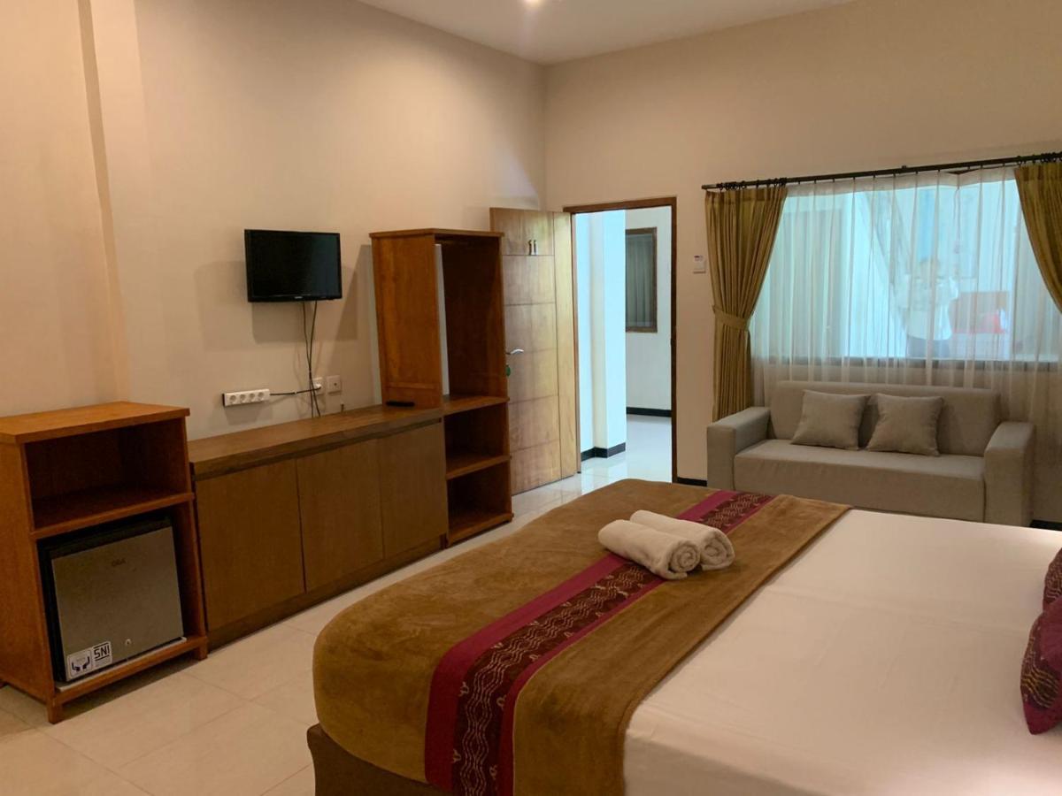 Kuta Suci Guesthouse Kültér fotó