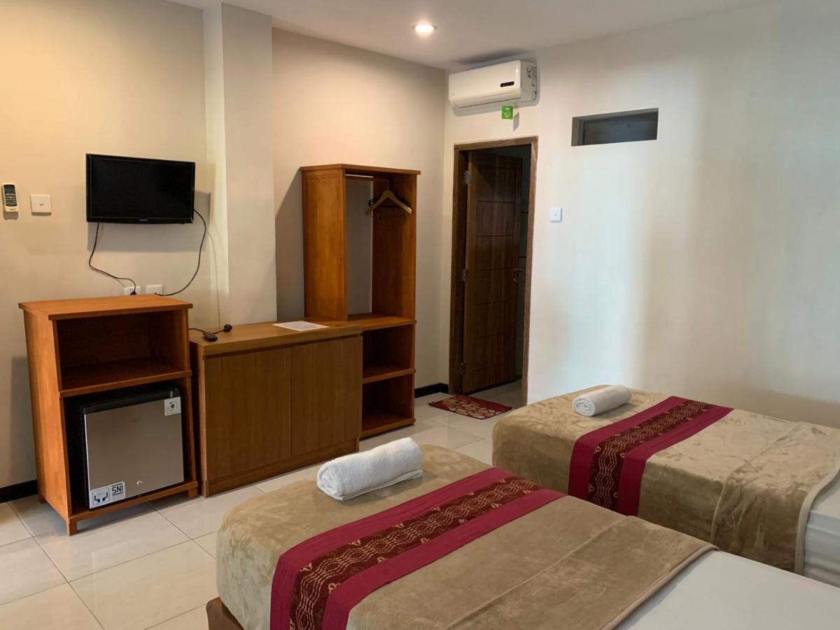 Kuta Suci Guesthouse Kültér fotó