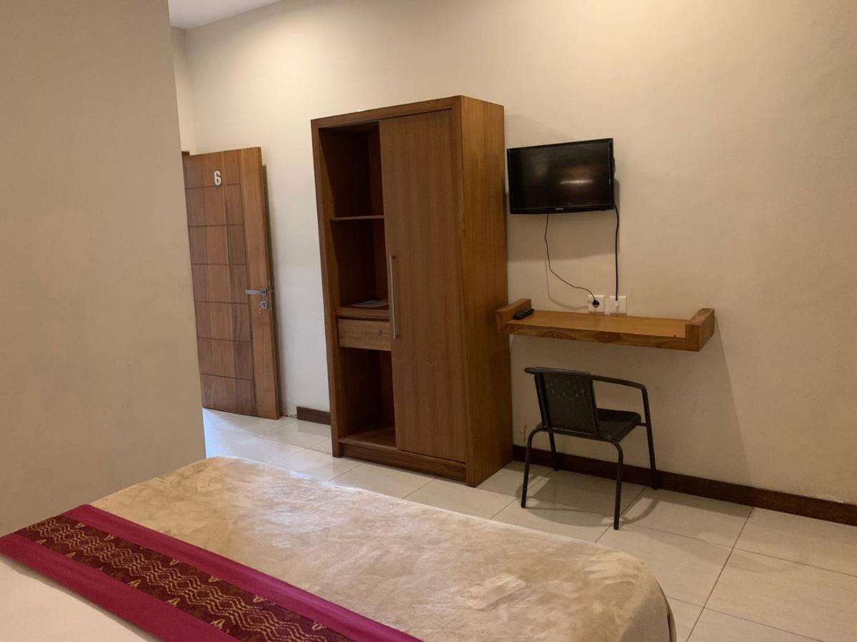 Kuta Suci Guesthouse Kültér fotó