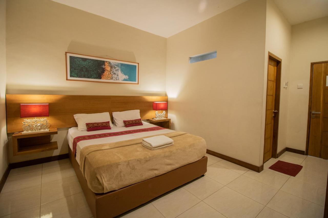 Kuta Suci Guesthouse Kültér fotó