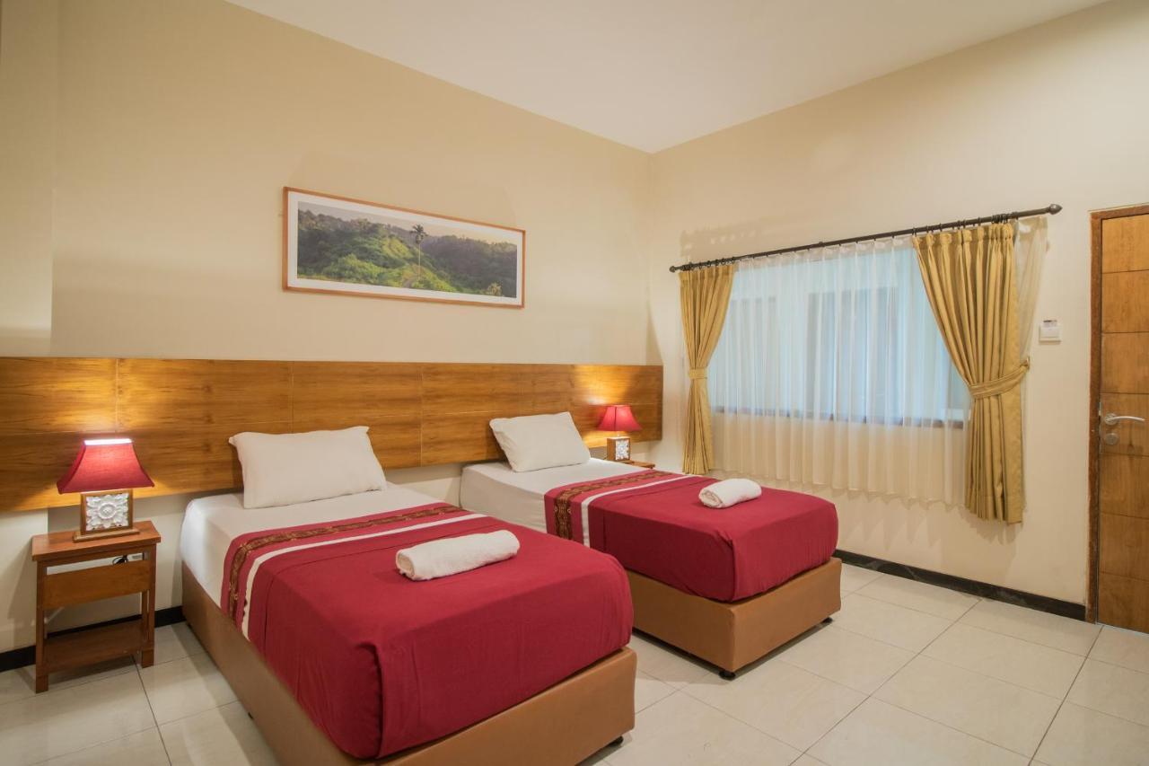 Kuta Suci Guesthouse Kültér fotó