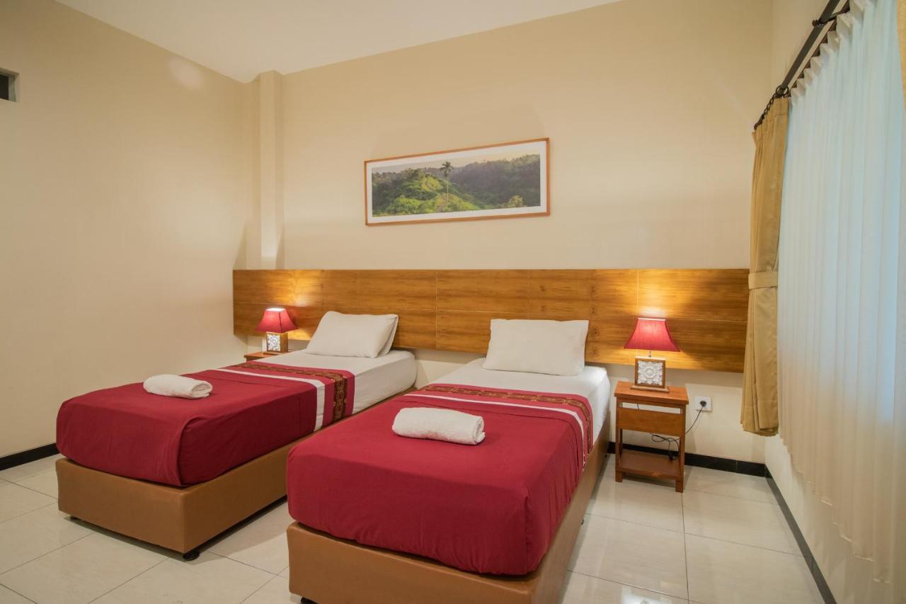 Kuta Suci Guesthouse Kültér fotó