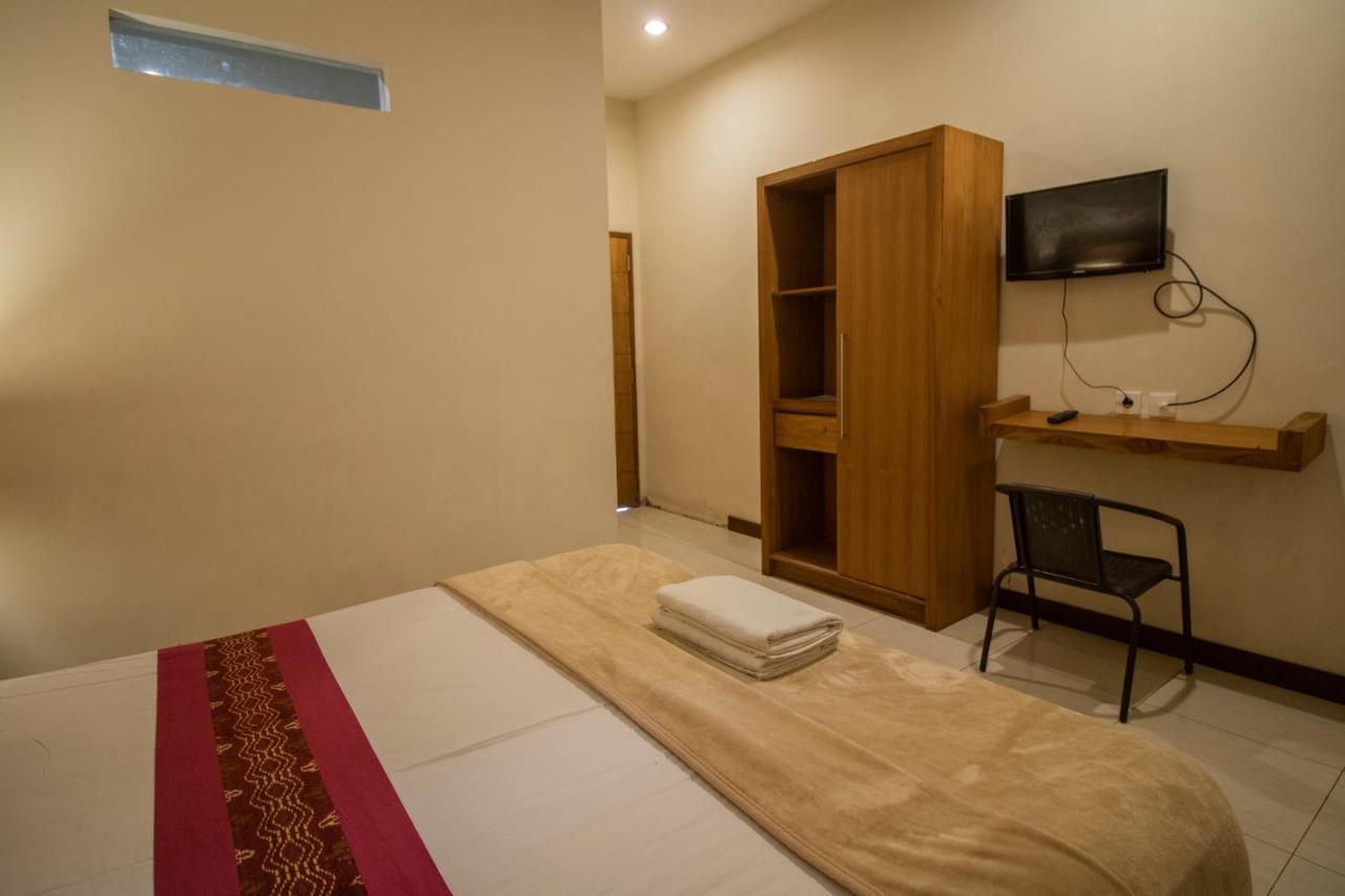 Kuta Suci Guesthouse Kültér fotó