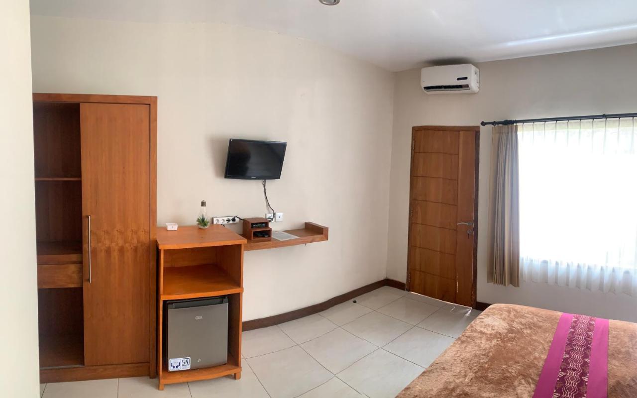 Kuta Suci Guesthouse Kültér fotó