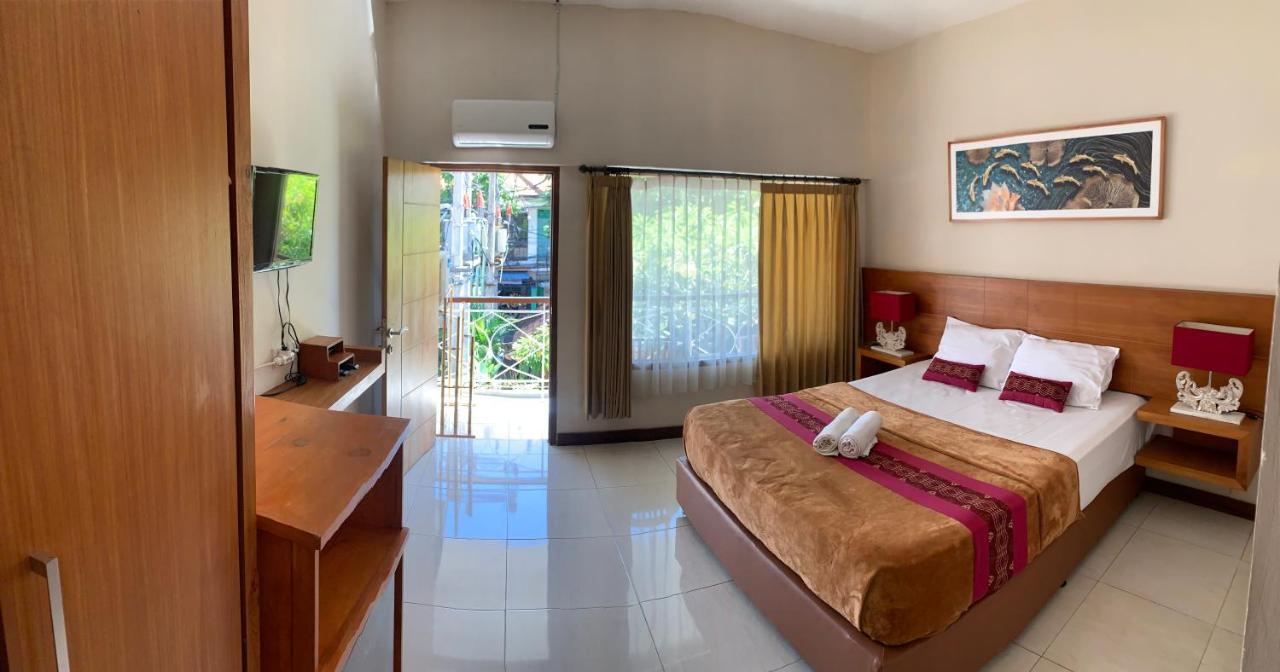 Kuta Suci Guesthouse Kültér fotó