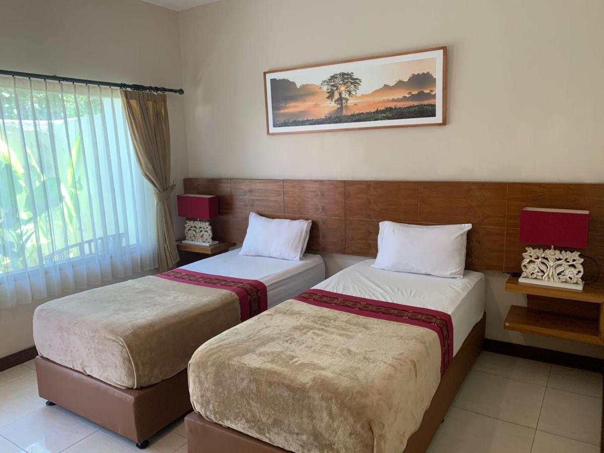 Kuta Suci Guesthouse Kültér fotó
