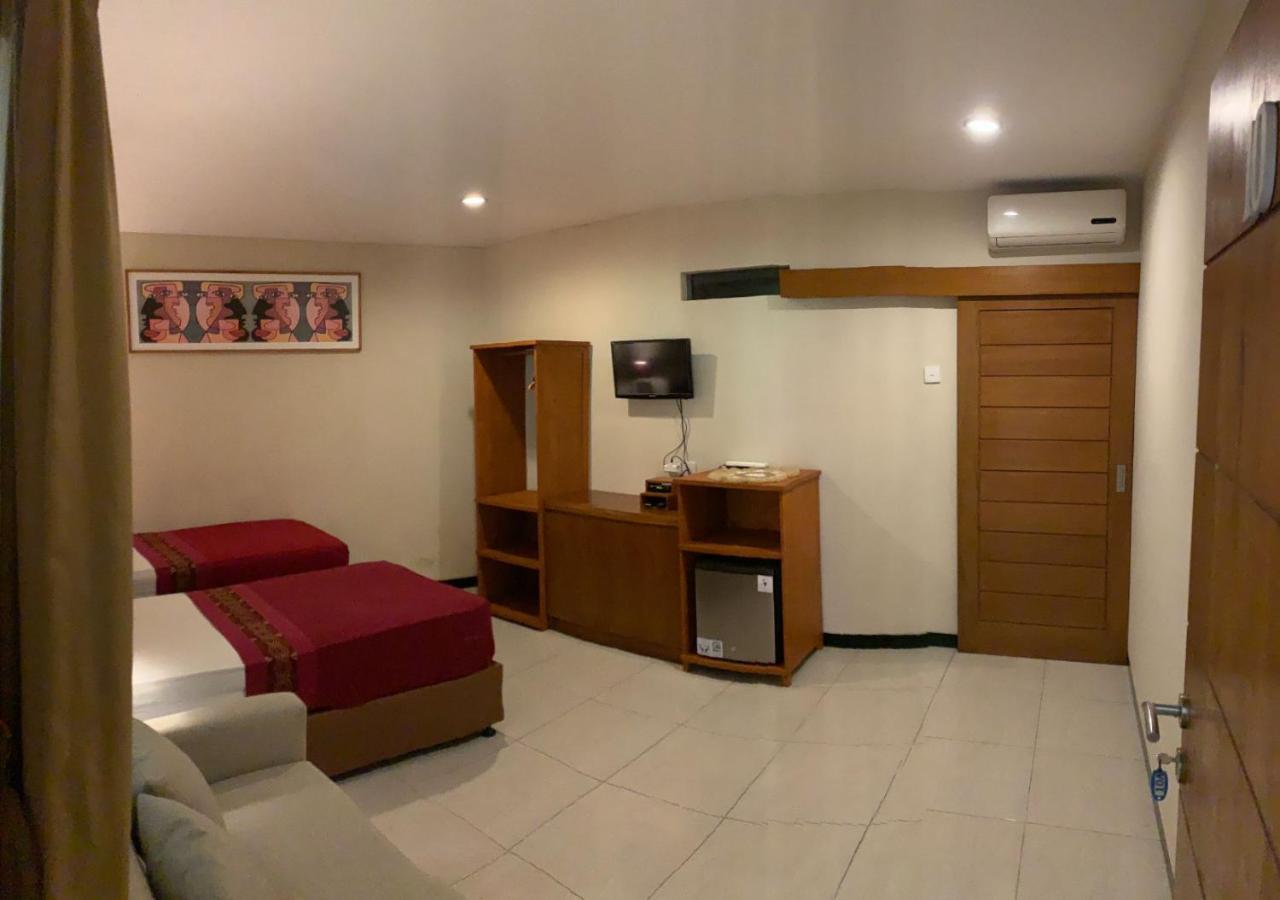 Kuta Suci Guesthouse Kültér fotó