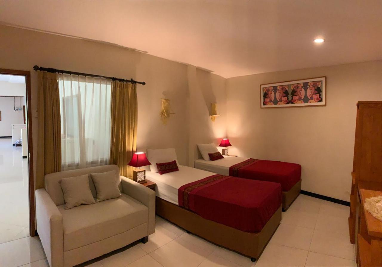 Kuta Suci Guesthouse Kültér fotó