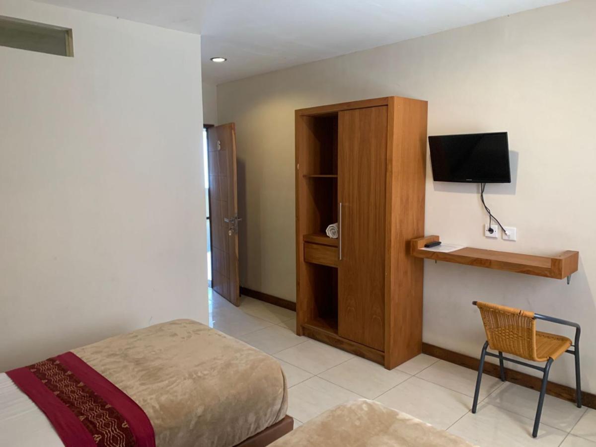 Kuta Suci Guesthouse Kültér fotó
