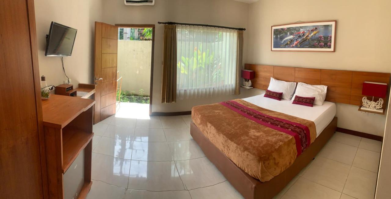Kuta Suci Guesthouse Kültér fotó