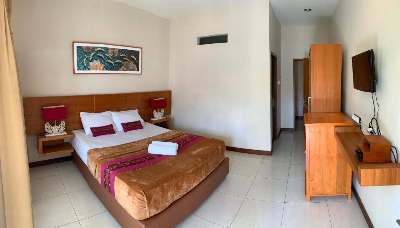 Kuta Suci Guesthouse Kültér fotó