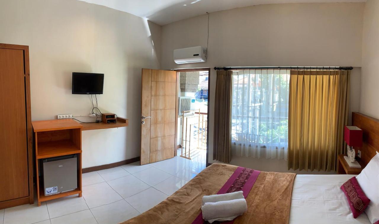 Kuta Suci Guesthouse Kültér fotó