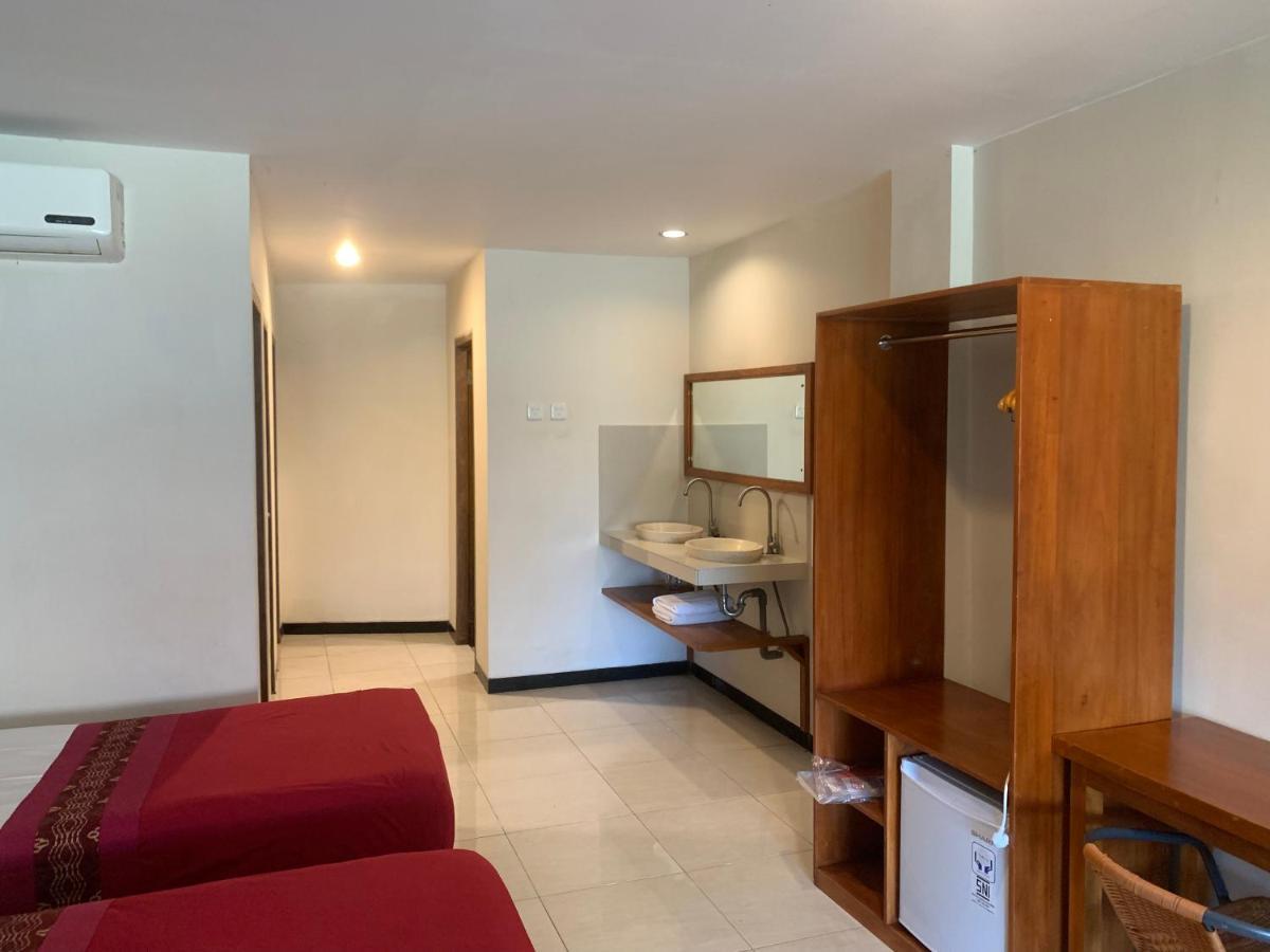 Kuta Suci Guesthouse Kültér fotó